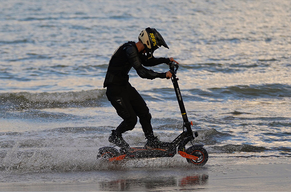 Patinete Eléctrico KuKirin G2 Max, neumáticos todoterreno de 10 pulgadas, motor de 1000 W, velocidad máxima de 55 km/h, batería de 48 V y 20 Ah, autonomía de 80 km, carga máxima de 120 kg, asiento desmontable y altura regulable.