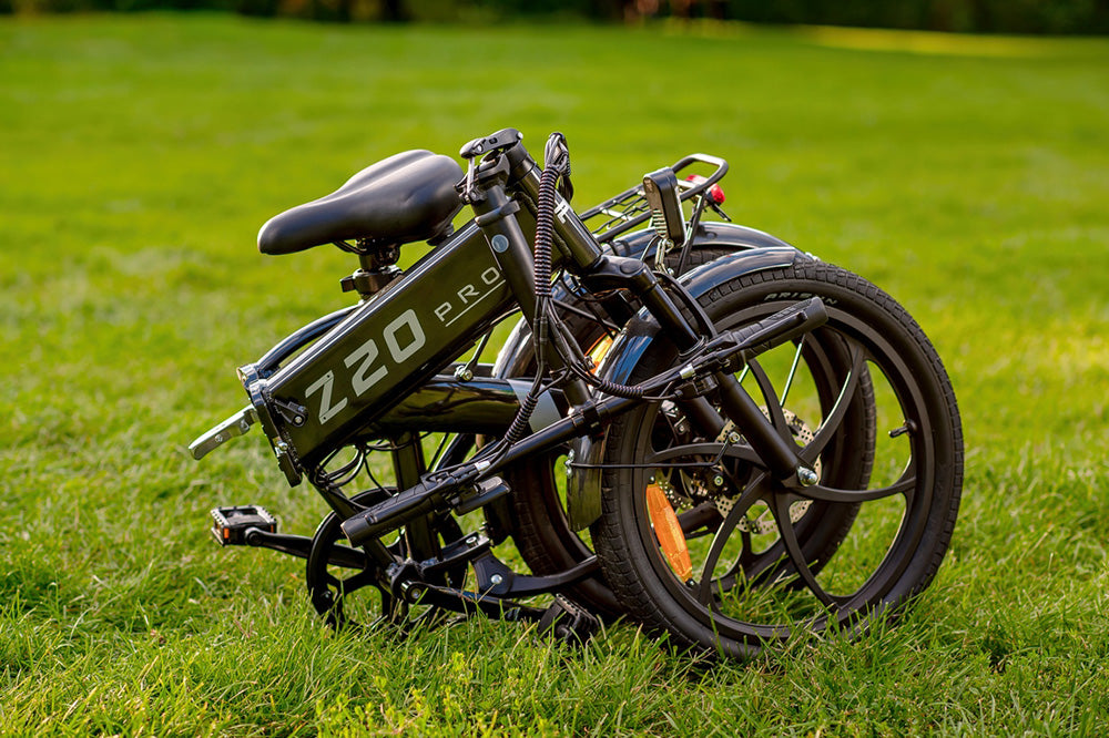 Bicicleta Eléctrica PVY Z20 Pro, Rueda de 20 Pulgadas, Motor de Buje de 250W, Velocidad Máxima 25 km/h, Batería Extraíble de 36V 10.4Ah, Autonomía de 80-100 km, Pantalla LCD - Gris